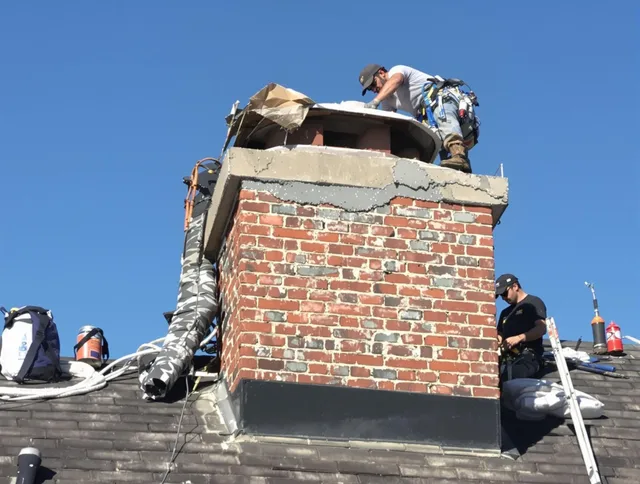 Seymour Chimney Sweep installing a custom chimney crown in Seymour, CT