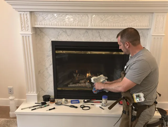 Seymour Chimney Sweep performing fireplace maintenance in Seymour, CT